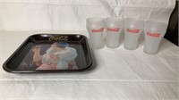 4 Coca-Cola glasses with tray