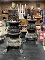 Two Cast Iron Pot Belly Stove Lamp Bases.