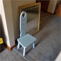 small chair, wall mirror