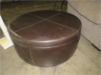 ROUND LEATHER LIKE LIFT TOP OTTOMAN W/STORAGE