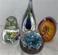 Glass paper weights.