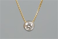 PLATINUM & DIAMOND PENDANT ON 18K CHAIN