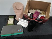 Box of jewelry display items and ring boxes