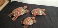 Group of wood decorative turtles