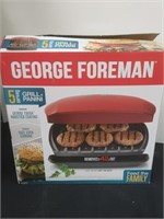 George Foreman grill and panini. Looks new in box