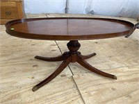 OVAL MAHOGANY PEDESTAL COFFEE TABLE