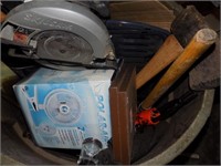 garbage can with tools fan , axe,