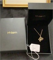 "H. Stern" 18K Gold Necklace with small Diamond