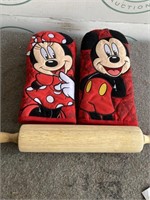 Micky mouse mittens and rolling pin