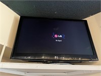 LG TV WITH REMOTE  -  49 x 31"