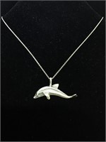 .925 silver Dolphin pendant on 16 in necklace.