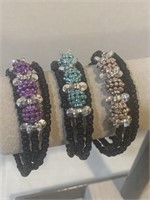 3- Small black beaded spiral bracelets