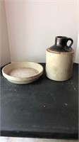 Wide mouth stoneware jug.  Small chip on side and