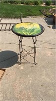 Two foot oak ice cream table. Has a picture on