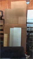 Large lot of misc sheets of wood and peg board