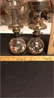 Pair of round glass oil lamps.