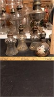 Lot of 4 glass oil lamps.  All missing flutes