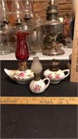 Lot of 3 floral porcelain oil lamps.  One is