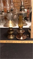 Pair of brass oil lamps.  One is a carrying