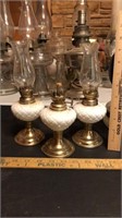 Set of 3 milk glass and brass oil lamps.  One is