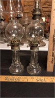 Pair of glass oil lamps with bulb flutes