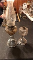 2 oil lamps, one plain Jane and a littler fancy
