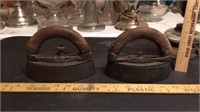 Pair of antique Howell Co. irons