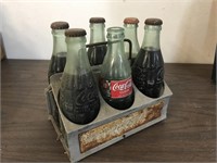 ALUMINUM COCA COLA  6 PACK  CASE AND COKES