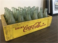 YELLOW COCA COLA CRATE AND BOTTLES