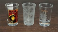 3 collector shot glasses 2 are Captain Morgan and