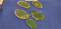 FIVE SLICES OF POLISHED GREEN GEODES