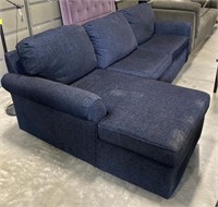 (L) 2 Piece Blue Sectional Couch. 105” x 62” x 41”