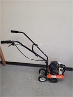 Garden tiller (like new looking condition)