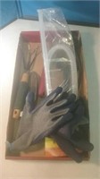 Gardening tools gloves and a fluid mover