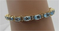 14 Kt Yellow Gold Blue Topaz Diamond Bracelet