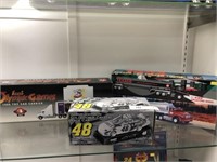3 Truck Banks and Jimmy Johnson Race Car