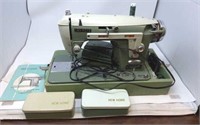 New Home Sewing Machine in case w/manual