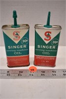 2 tins Singer Sewing Machine Oil (both open)