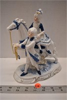 Blue and white Victorian gentleman and lady out