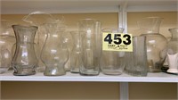 Clear glass vases and other