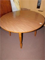 FORMICA 41 1/2" ROUND TABLE WITH MAPLE LEGS