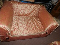 LOVE SEAT WITH GOLDEN AND MAROON FLORAL DESIGN;