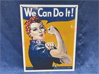 Ande Rooney's "We Can Do It" porcelain enamel sign