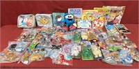 Collection of mini Beanie Baby items and books,