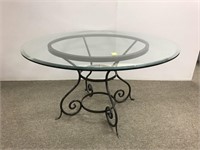 Round glass top table with iron base