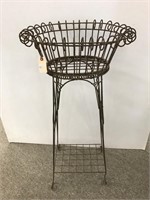 Ornate tall metal wire planter