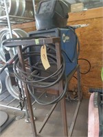 Miller wire welder with cart and helmet
other in