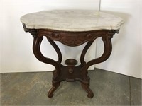 Beautiful Victorian turtle top marble top table