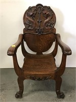 Outstanding carved oak arm chair