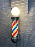 Antique rotating barber pole